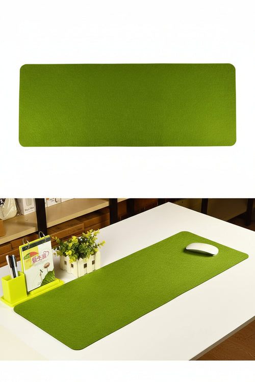Light Green desk mat with white keyboard and mouse on a modern computer workstation